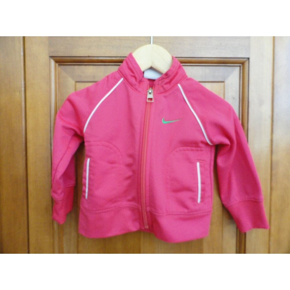 Nike DRI-Fit girls' pink long-sleeve zip jacket - Size 6/9 Months